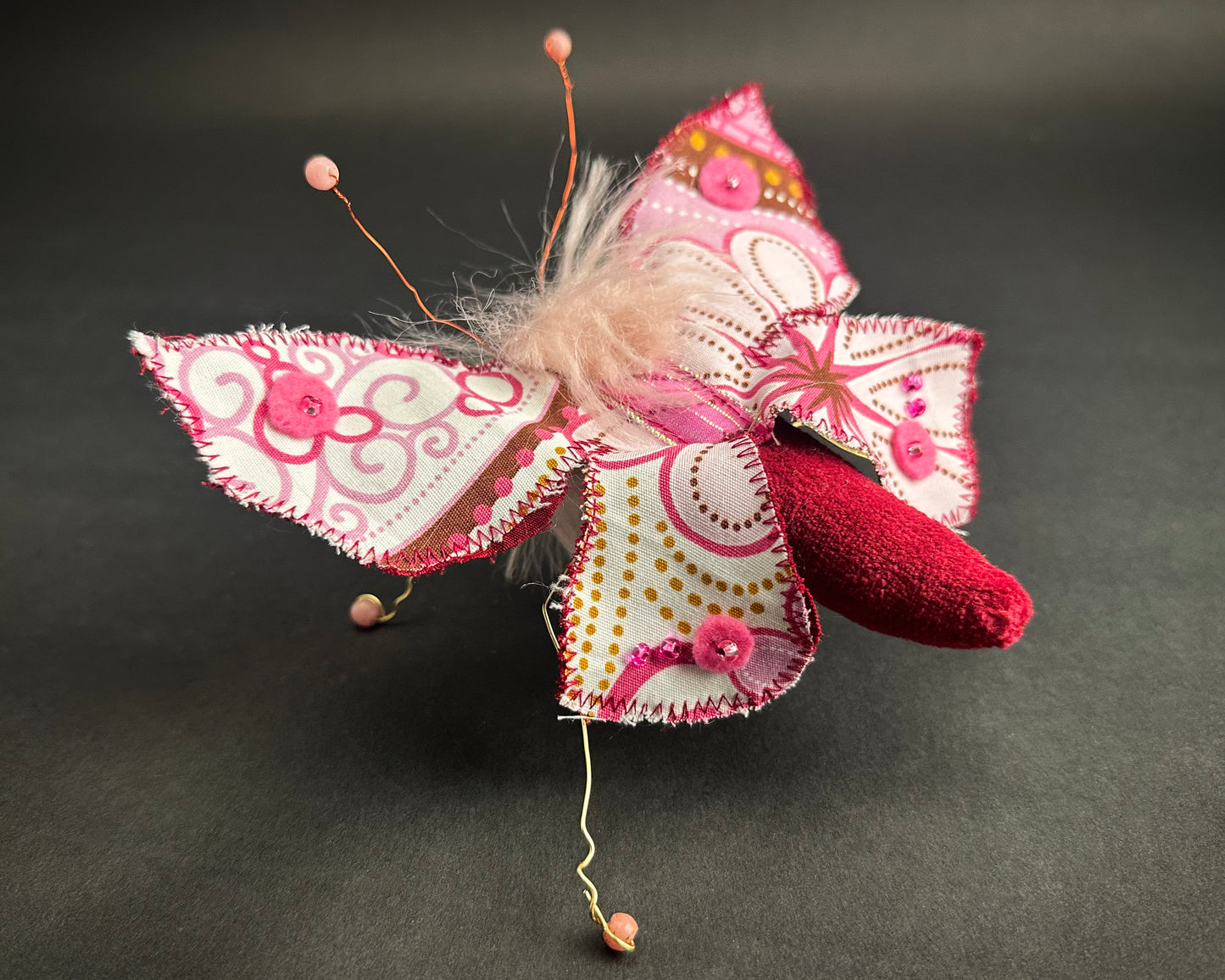 Ronita Yvarra - The Rosebud Rascal Moth
